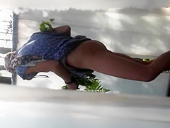 Laughable catch of a angel wiping with leaves