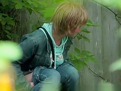 Short hair blond caught peeing outdoors