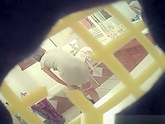 Older changing her raiment for couch