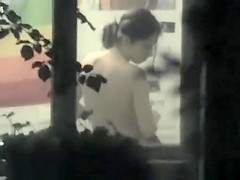 Ravishing neighbor changes garments in bedroom