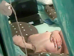 Peeping on a legal age teenager angel throughout a window