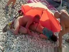 Nudist stud eats womans arse