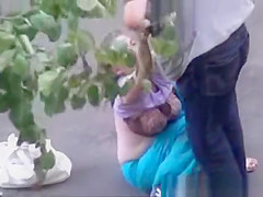 Completely drunk woman on the street