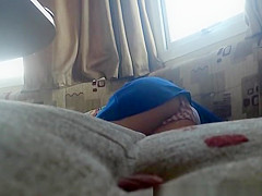 Cutie lies down in daybed upskirt