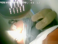 Woman having her anus inspected