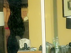 Sexy hottie spied throughout hotel window