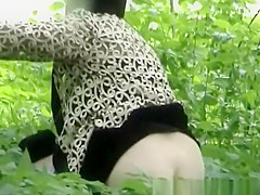 Woman peeing after some other