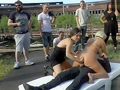 Blond selling booty in group public fuck