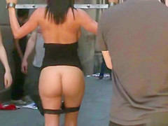 Dark Brown in metal shackles in public