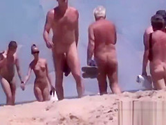 Walkers on Undressed Beach