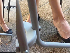 Cute girlfriend barefoot dangling in balerinas