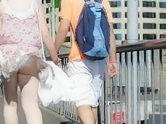 Wind discloses her large ass upskirt