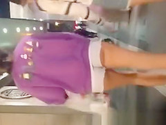 Gals in constricted jeans shorts