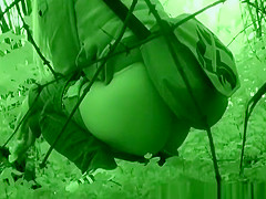 Golden-Haired caught pissing beyond some trees