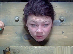 Restrained sub whipped during the time that anally hooked