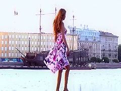 Angel adjusting her pants