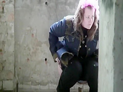 Fascinating gals spied pissing in a ruined abode