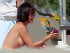 Delightsome topless chick with large boobs