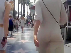 Woman in watch throughout suit darksome belt