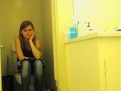 Legal Age Teenager with tattooed arm pissing