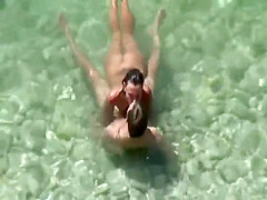 Sexy legal age teenager gals cover ally with sand