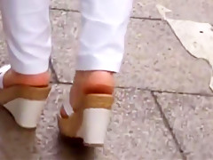 Candid aged soles in wedge sandals
