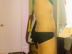 Oriental Slutwife changing in the bedroom - spycam