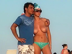 This Babe is pleased to pose for a topless photo