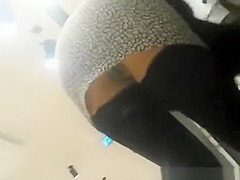 Woman in dark nylons and short petticoat upskirt