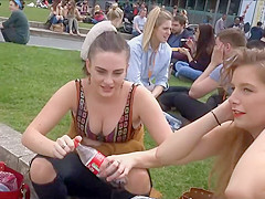 Breasty gal smiles and waves at me