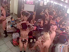 Strippers in change room counting specie