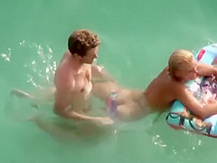 Boy trying to fuck her in the water