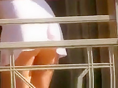 Sexy balcony spy (no pants)