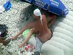 Naked woman preparing food