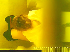 Youthful golden-haired peeing