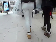 Angels in taut jeans panties walking in the street