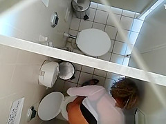 Hidden camera in public shitter ceiling