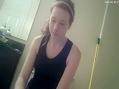 Ginger beauty is spied during the time that taking a urinate