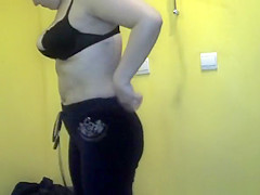 Obese woman spied in tanning room dressing