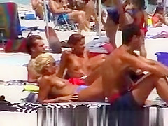 Sexy topless at the beach