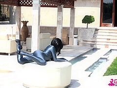 Stripped Rubber Doll Relaxing By The Pool - Watch4Fetish