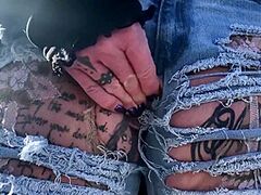 Outdoor Play With Her Pierced And Tattooed Muff In Jeans