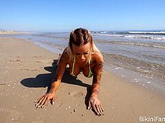 Fake bazookas bikini model in public