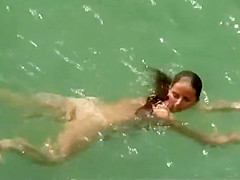Incredible exposed gal takes a swim