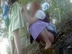 Hotties caught peeing in inclined ground