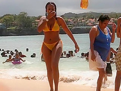 Eye candy dark gal on the beach