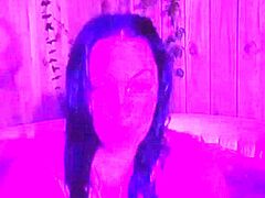 Brunnette flashing her pantoons at the sexy tub