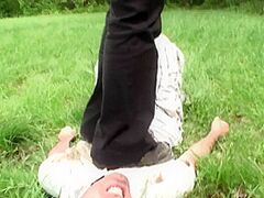 Outdoor trampling torture with oozy shoes by Femdom Austria