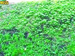 eighteen year old beauty is giving a head outdoor