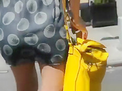 Woman Wearing Watch Throughout Suit in the Streets